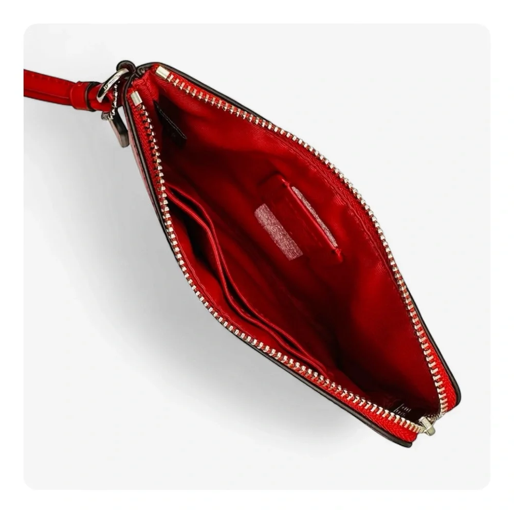 β
Coach RARE Western Rivets Wristlet - Red/Silver β
- Picture 7 of 16